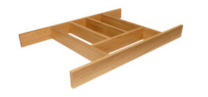 An wooden cutlery drawer insert.